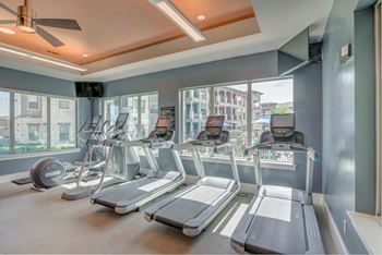 A gym with treadmills